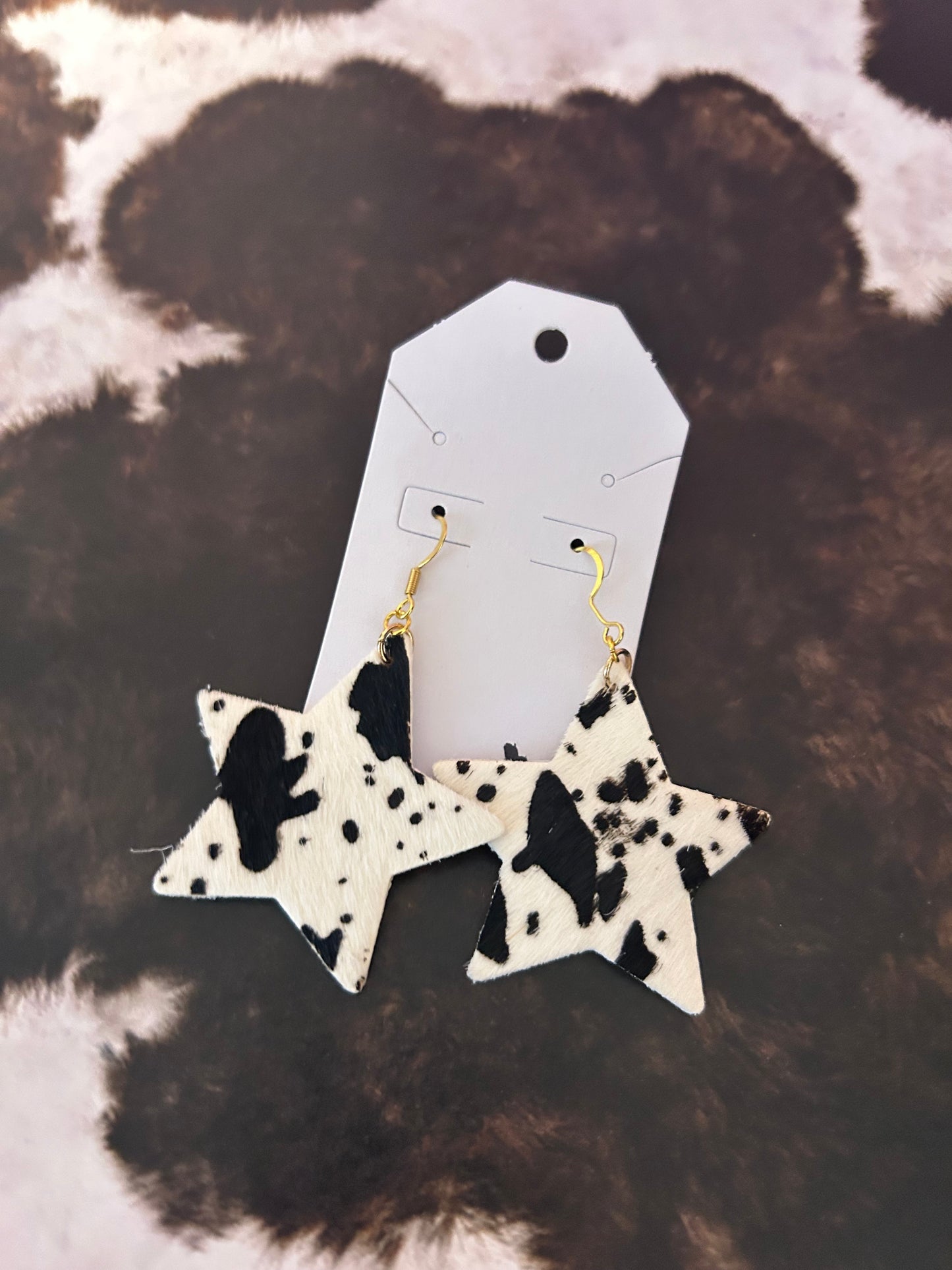 Cow star earrings