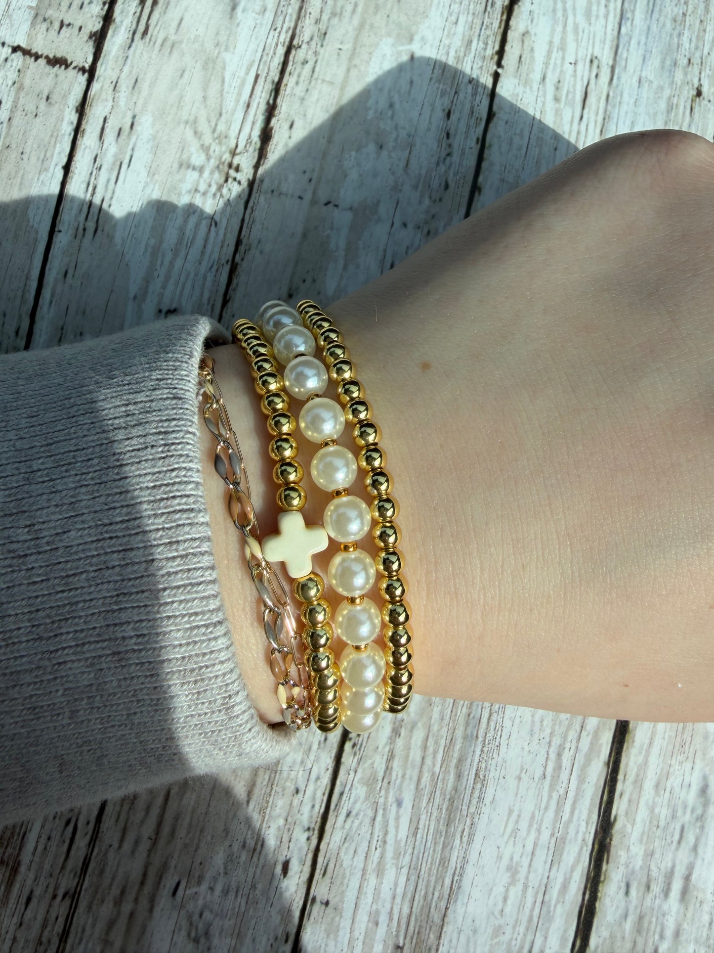 White cross non tarnish bracelet set (3)