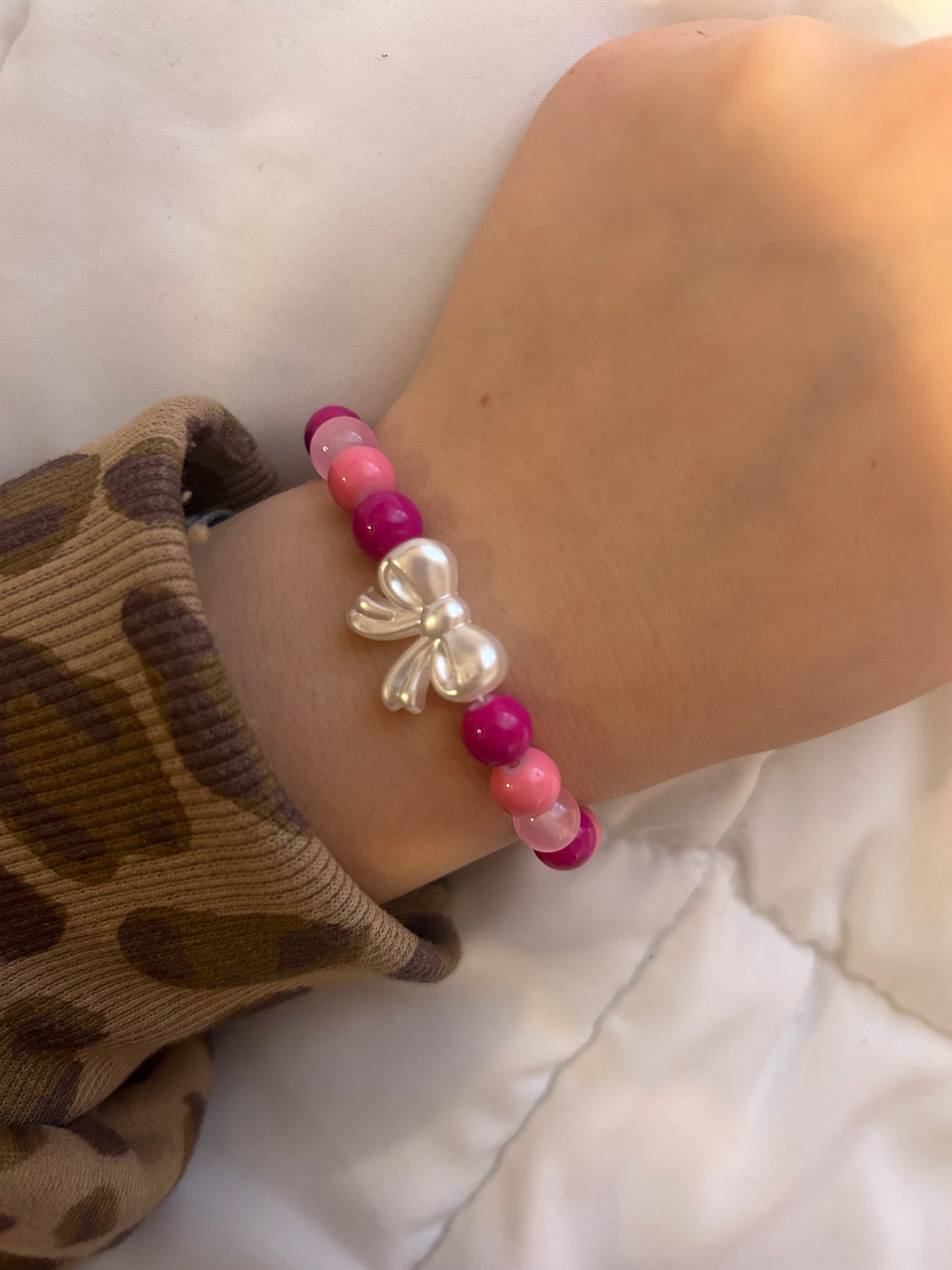 Pink bow bracelet