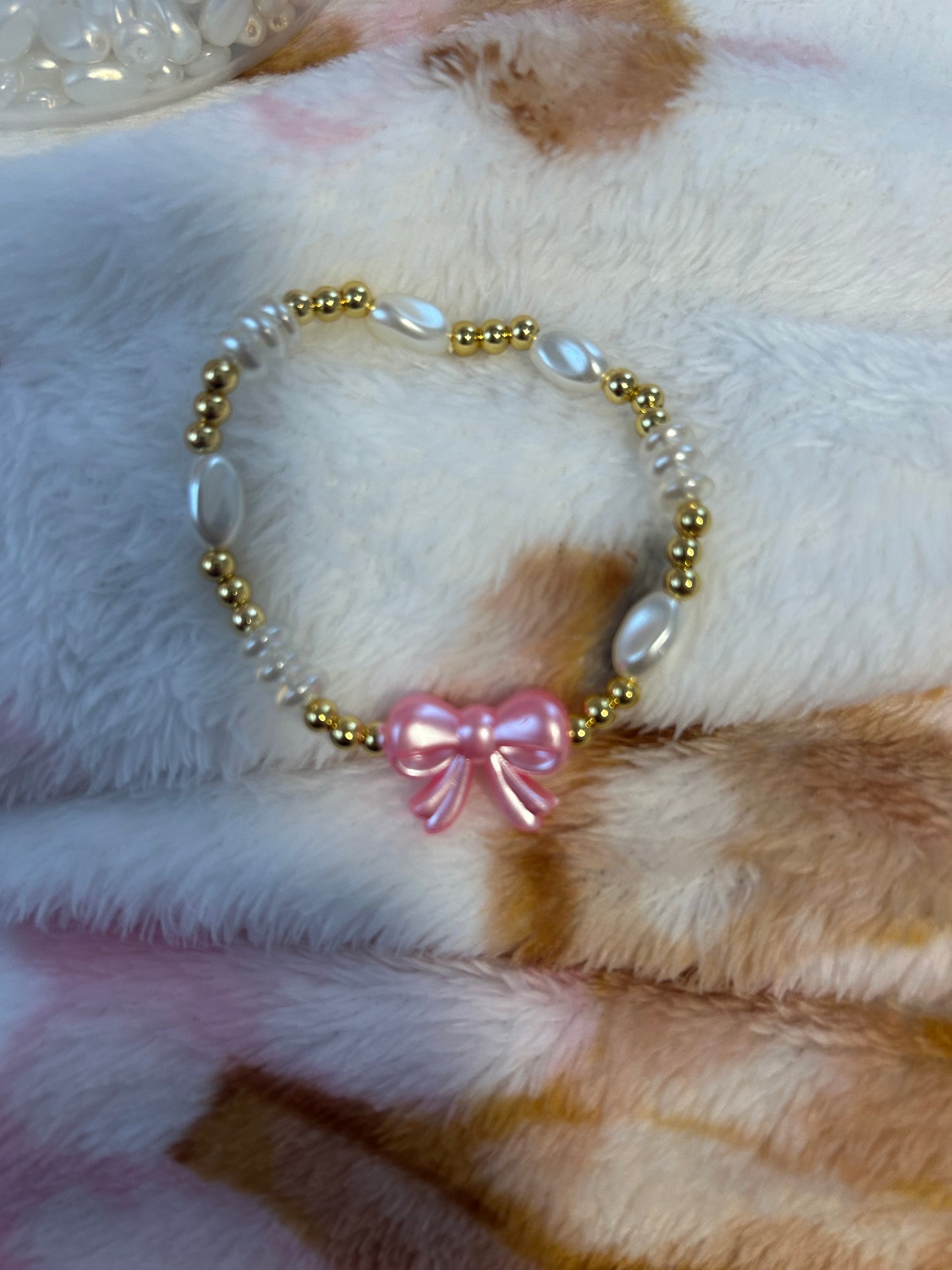 Kids, pink bow bracelet non tarnish size 5.5 -6.0