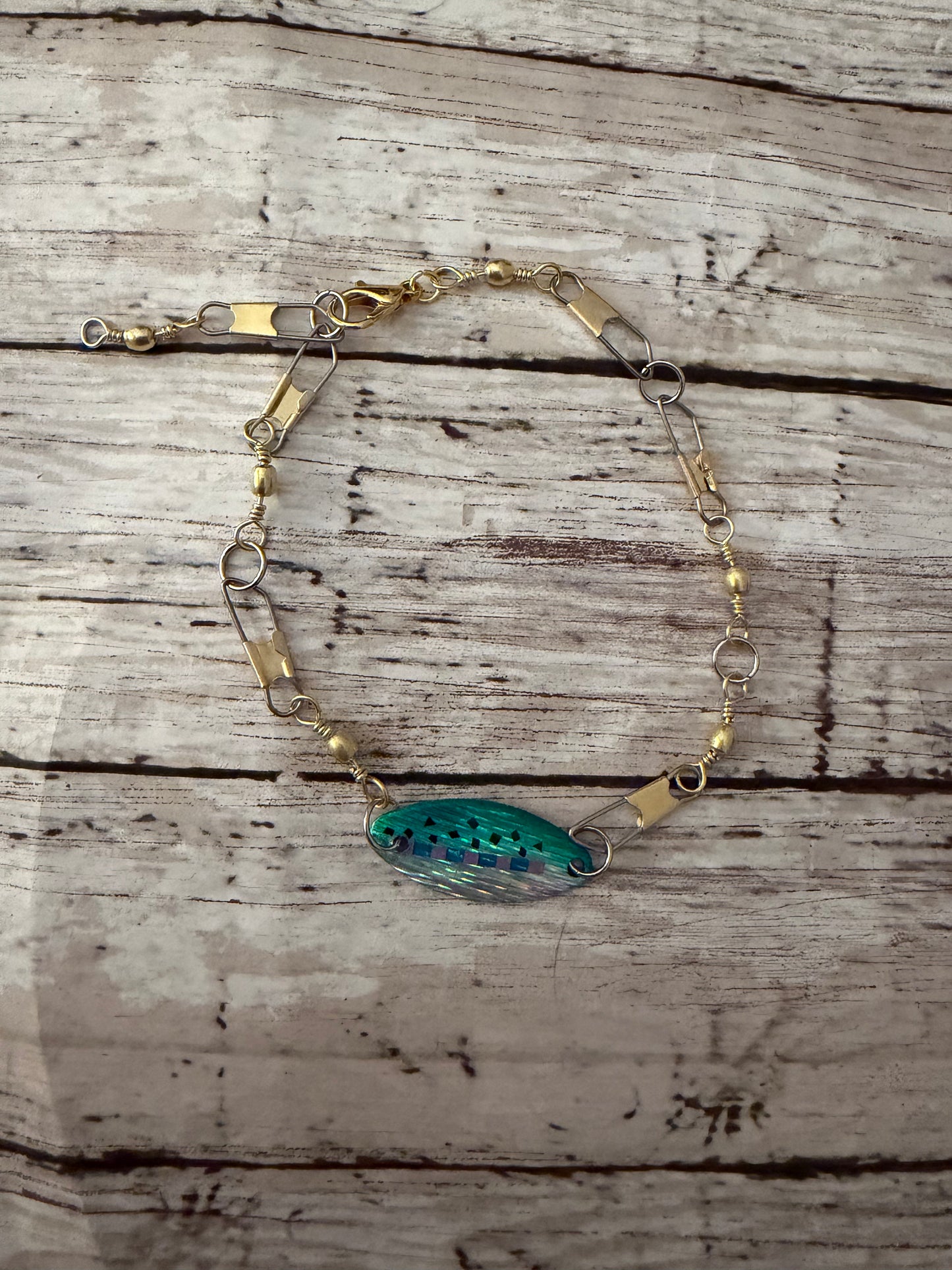 Teal/ green lure and swivel adjustable bracelet in gold