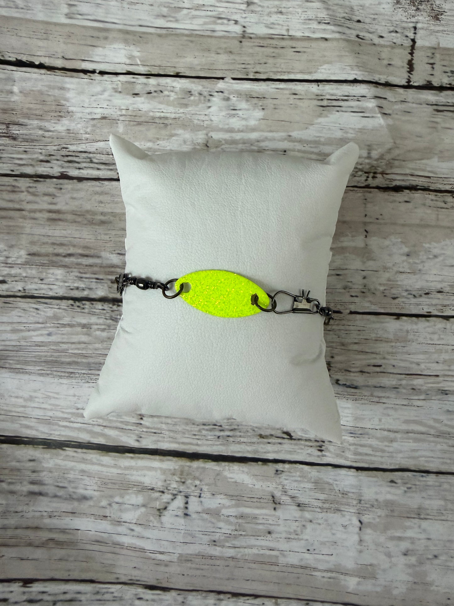 Rooster tail neon lure and black swivel adjustable bracelet