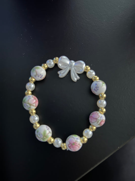 Floral bow bracelet non tarnish