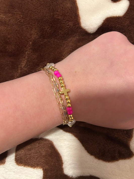 Pearly non tarnish pink cross bracelet