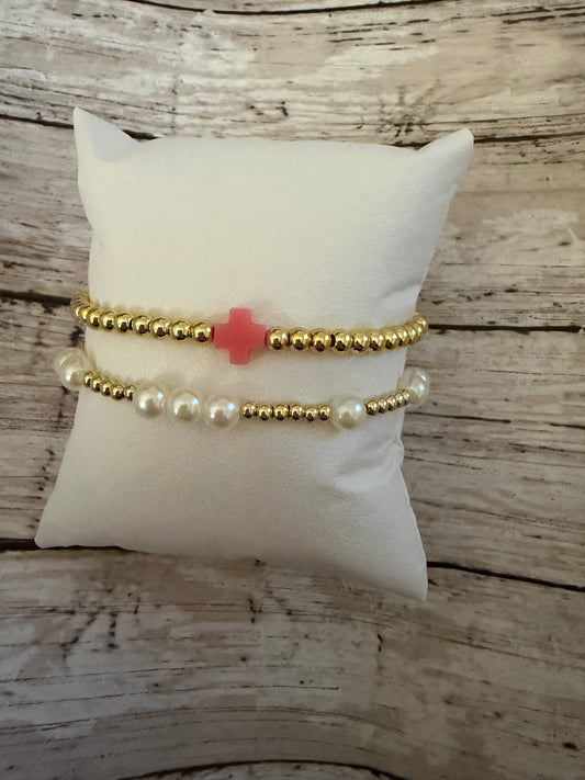 Pearl and light pink Easter cross set in gold
