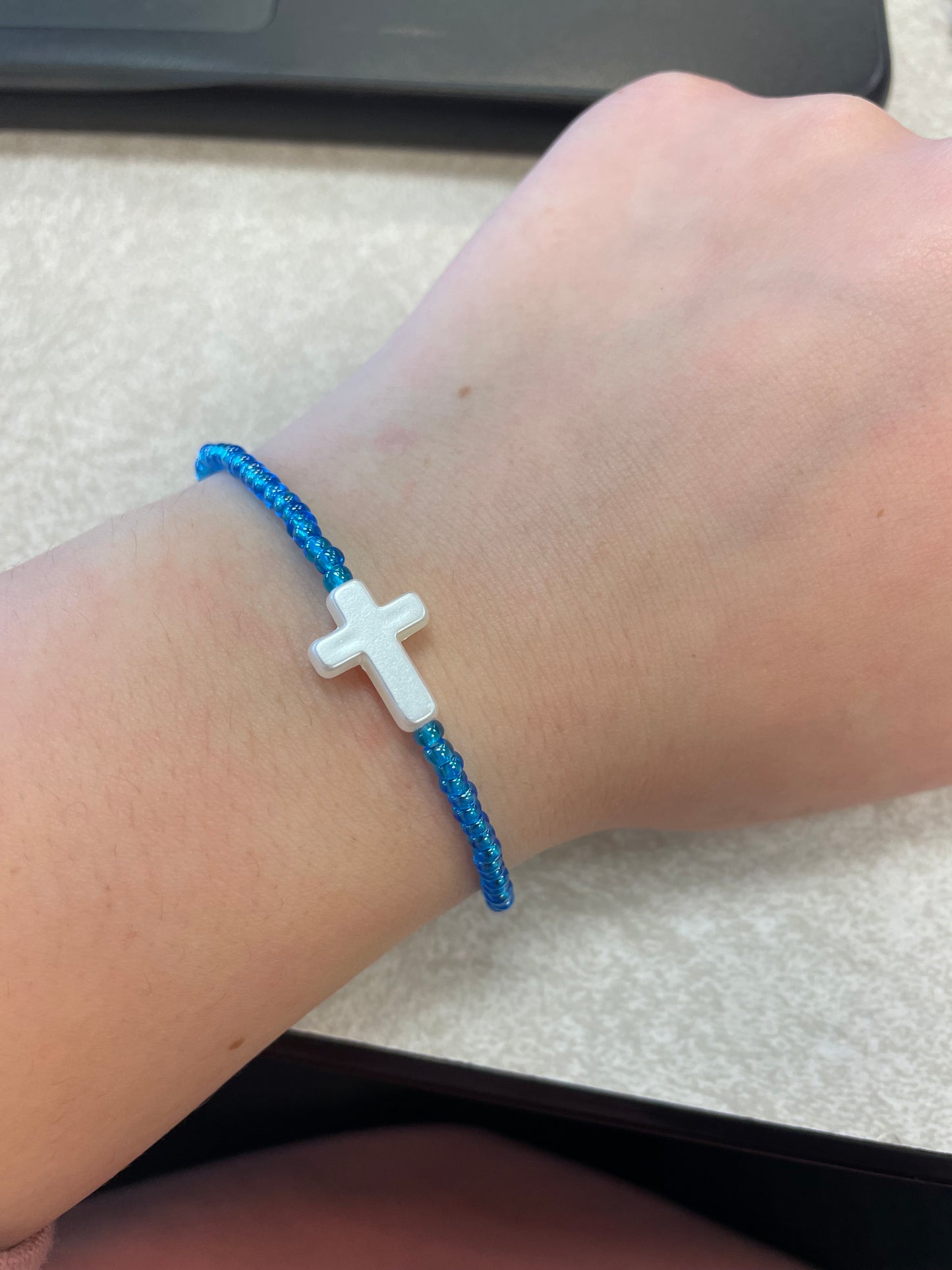 Blue cross bracelet