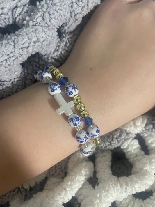 Non tarnish blue floral cross set