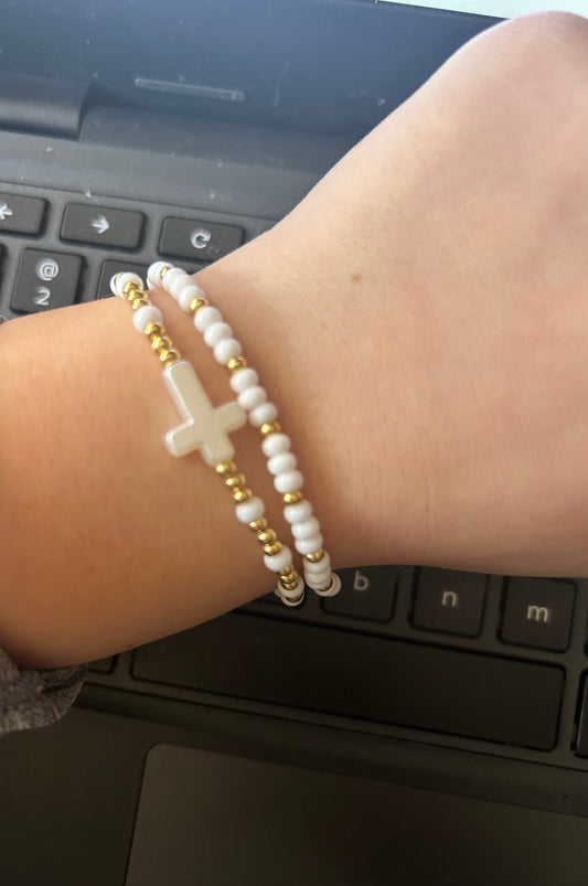 Cross bracelet pair in gold