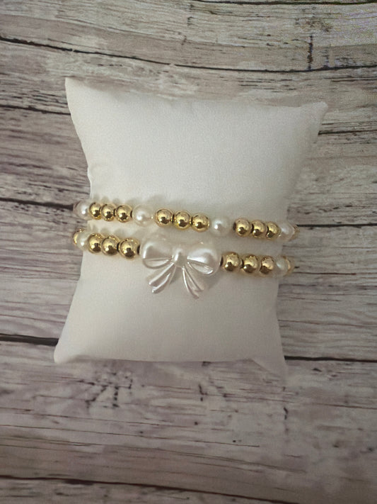 Bright bow set in gold non tarnish