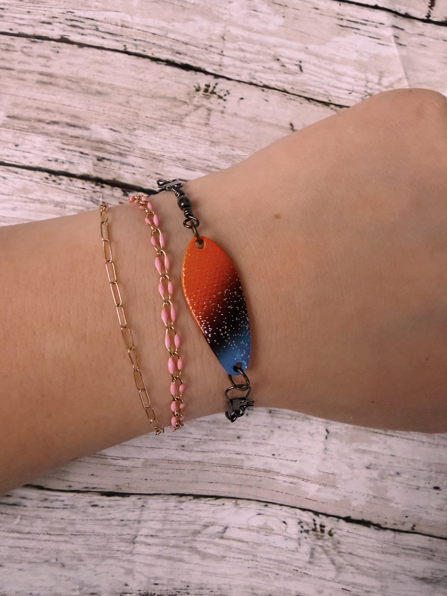 Orange and blue sparkle lure black swivel adjustable bracelet