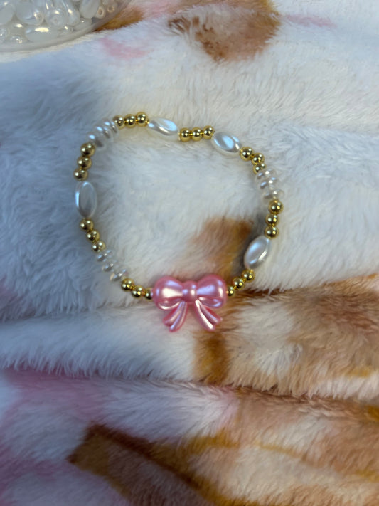 Kids, pink bow bracelet ￼non tarnish size 5.5 -6.0