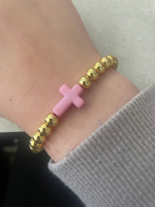 Non tarnish pink cross bracelet