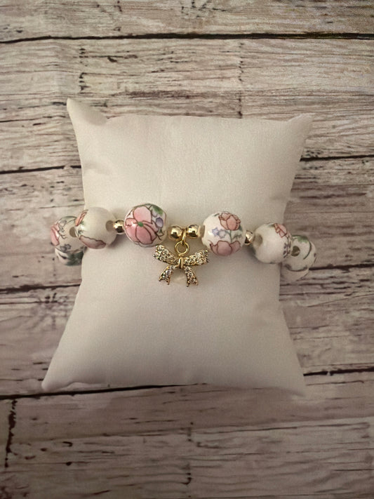 Pink floral bow charm bracelet gold filled
