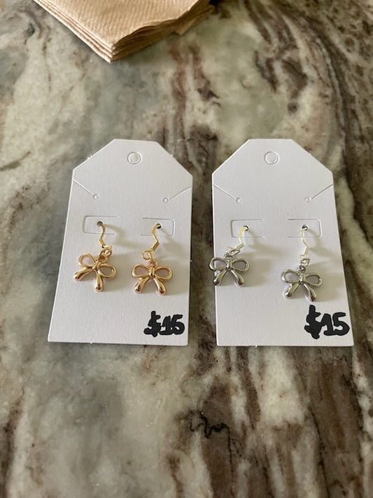 Gold and silver bow earring