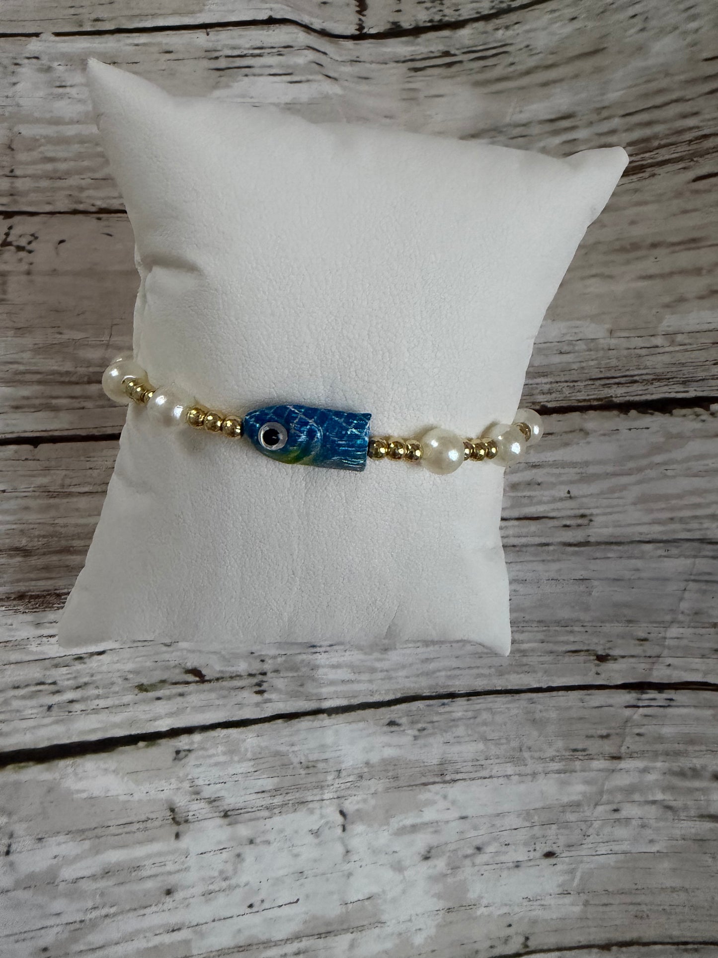 Blue fish fishing lure non tarnish bracelet in gold