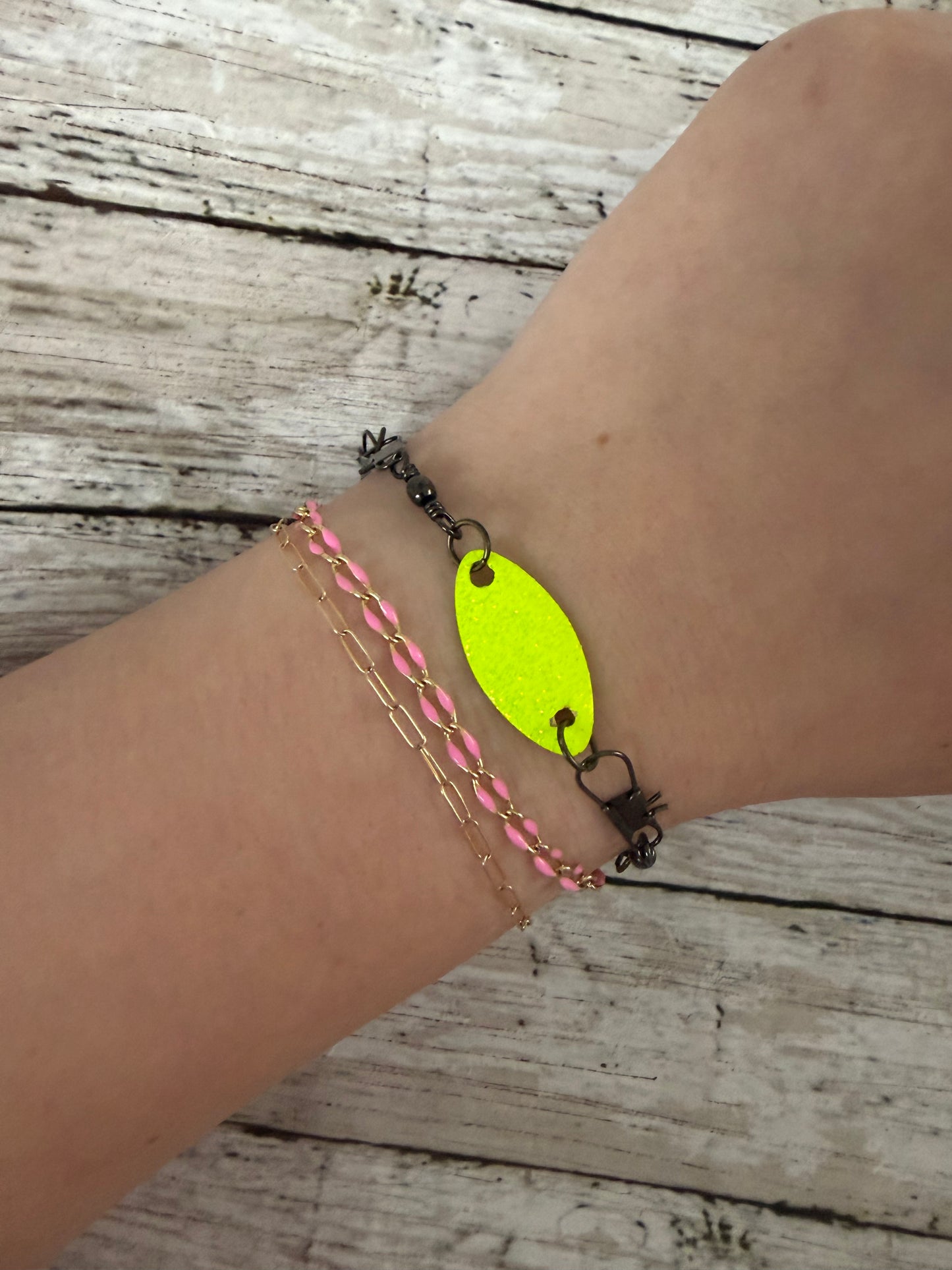 Rooster tail neon lure and black swivel adjustable bracelet