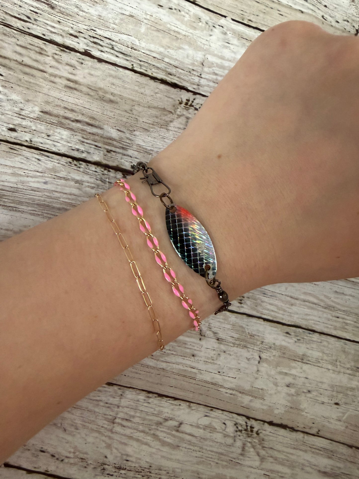 Blue fox black and red lure with black swivel adjustable bracelet