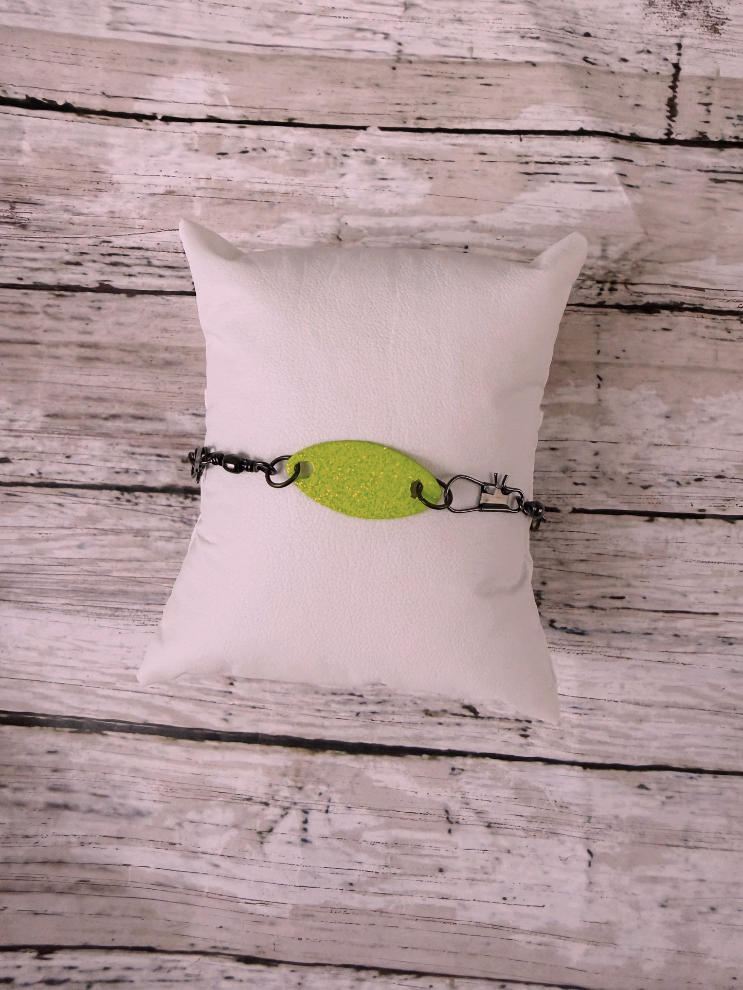 Rooster tail neon lure and black swivel adjustable bracelet